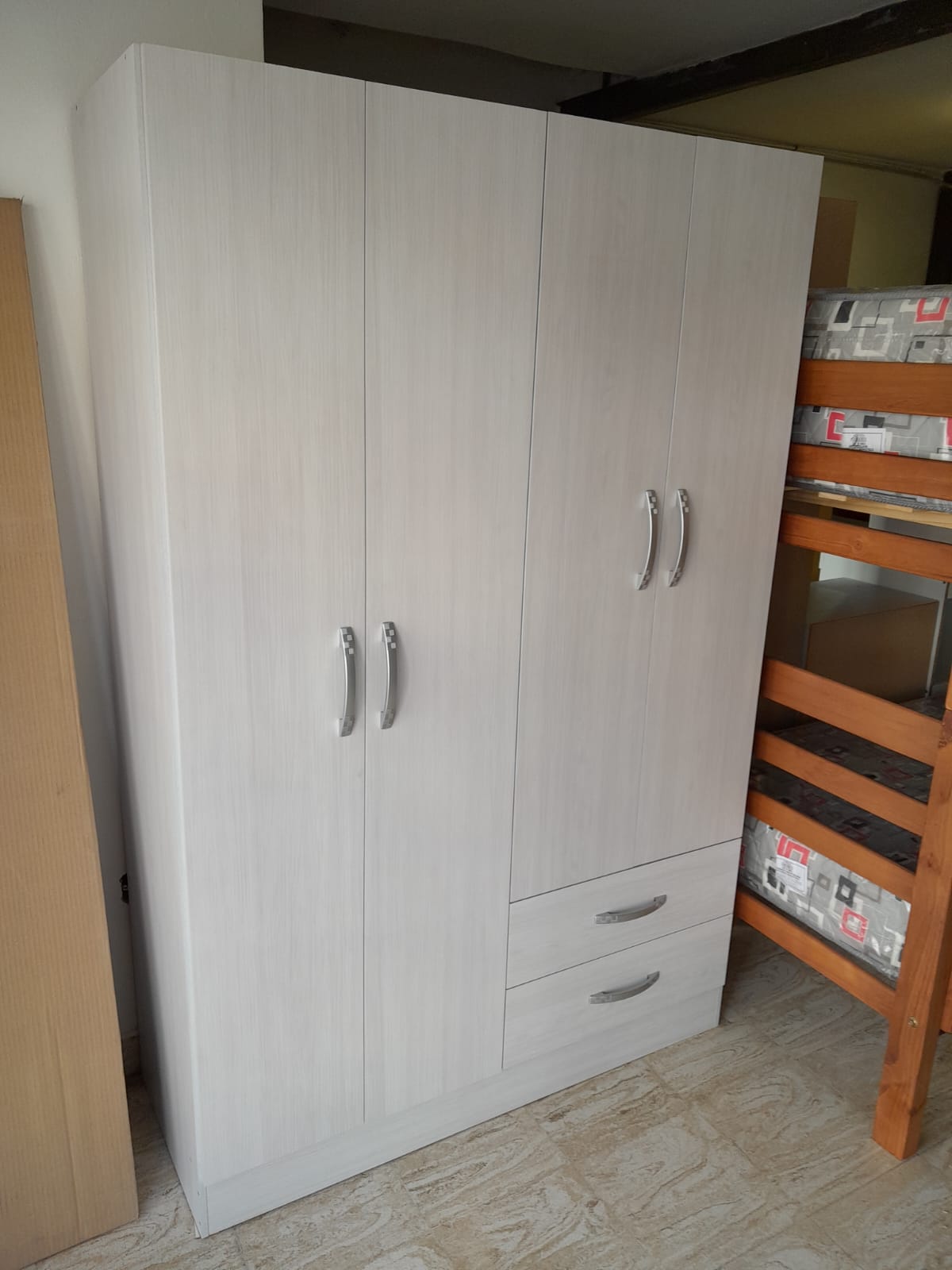 Placard Benevento blanco alpino, con cuatro puertas y dos cajones